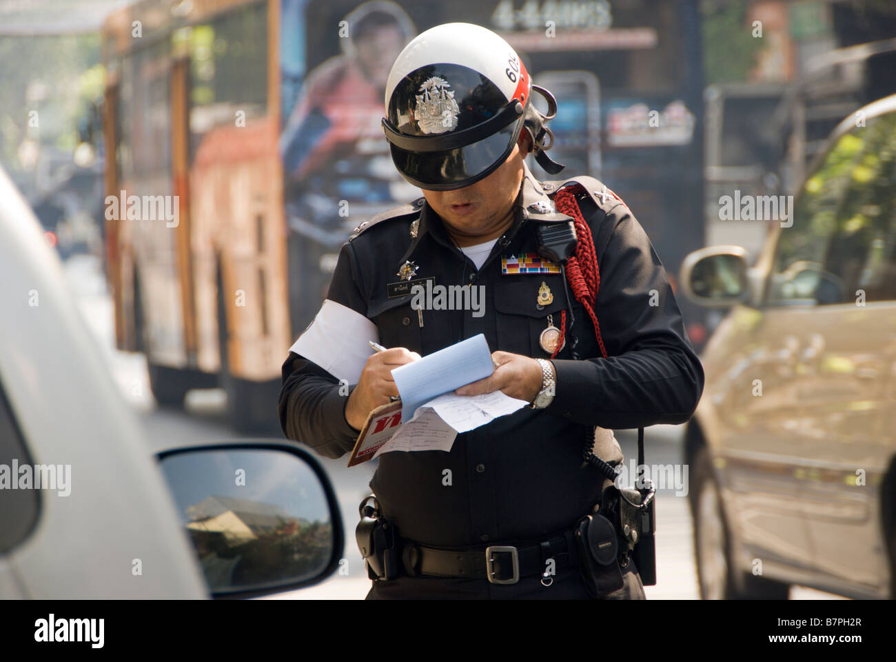 Image result for picture of Thai policeman issuing someone a ticket