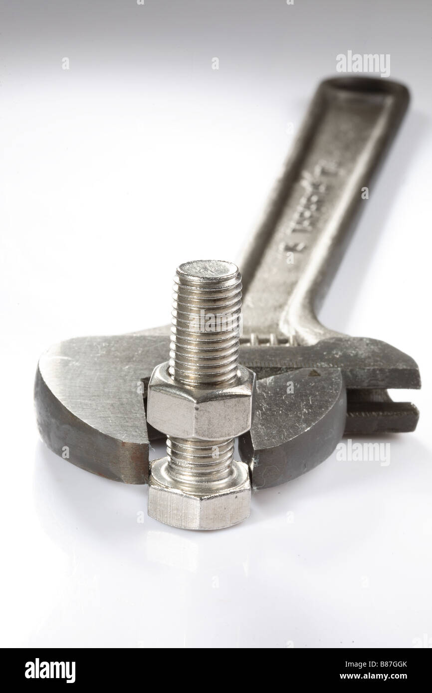 Nut, bolt and adjustable spanner Stock Photo, Royalty Free Image