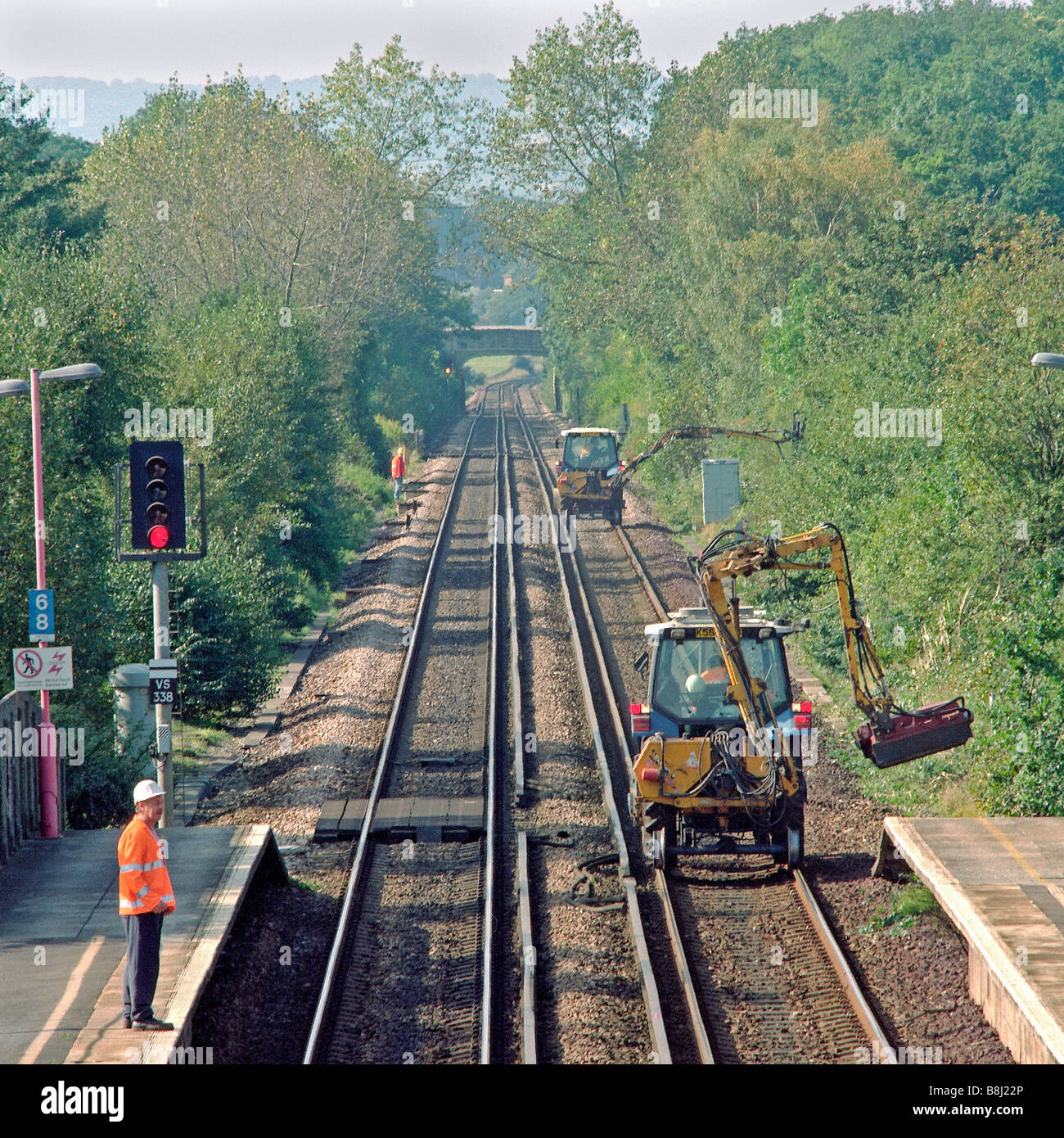 RoadRail machines cutting lineside vegetation to prevent leaffall