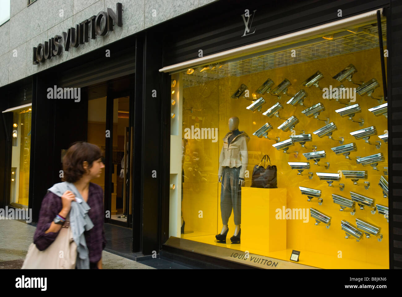 Louis Vuitton shop along Passeig de Gracia in Eixample district of Stock Photo, Royalty Free ...