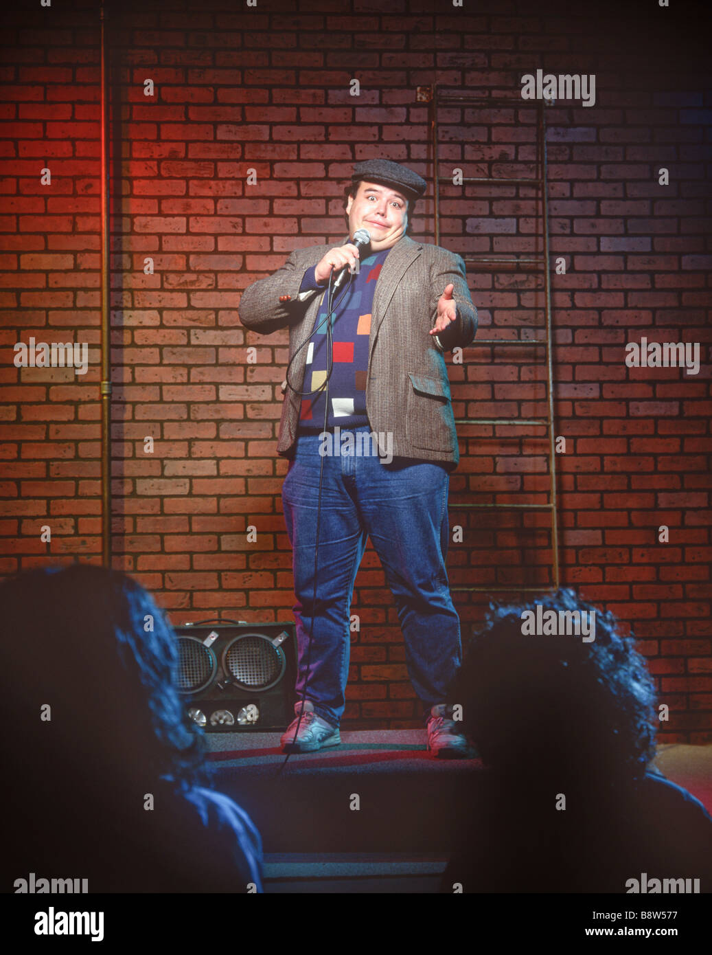 comedy club routine of standup comedian Stock Photo, Royalty Free Image