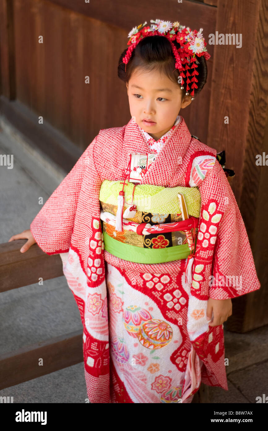 Young Japanese Girl In A Beautiful Kimono In A Cere