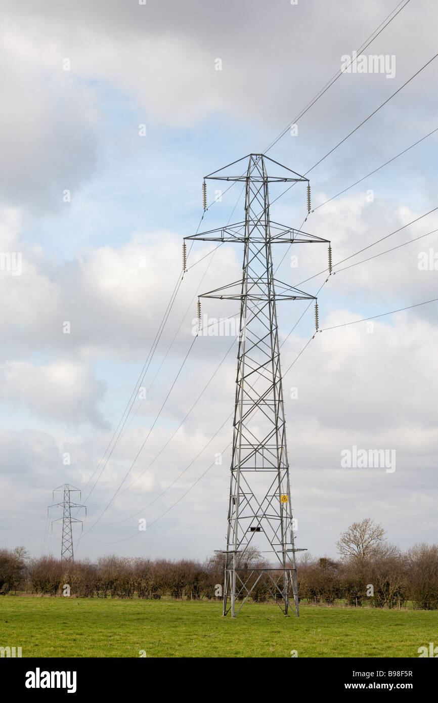 High voltage electricity pylons in the English countryside Stock Photo