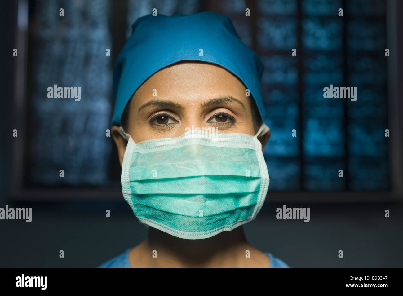 Portrait Of A Female Surgeon Wearing A Surgical Mask Stock Photo Alamy