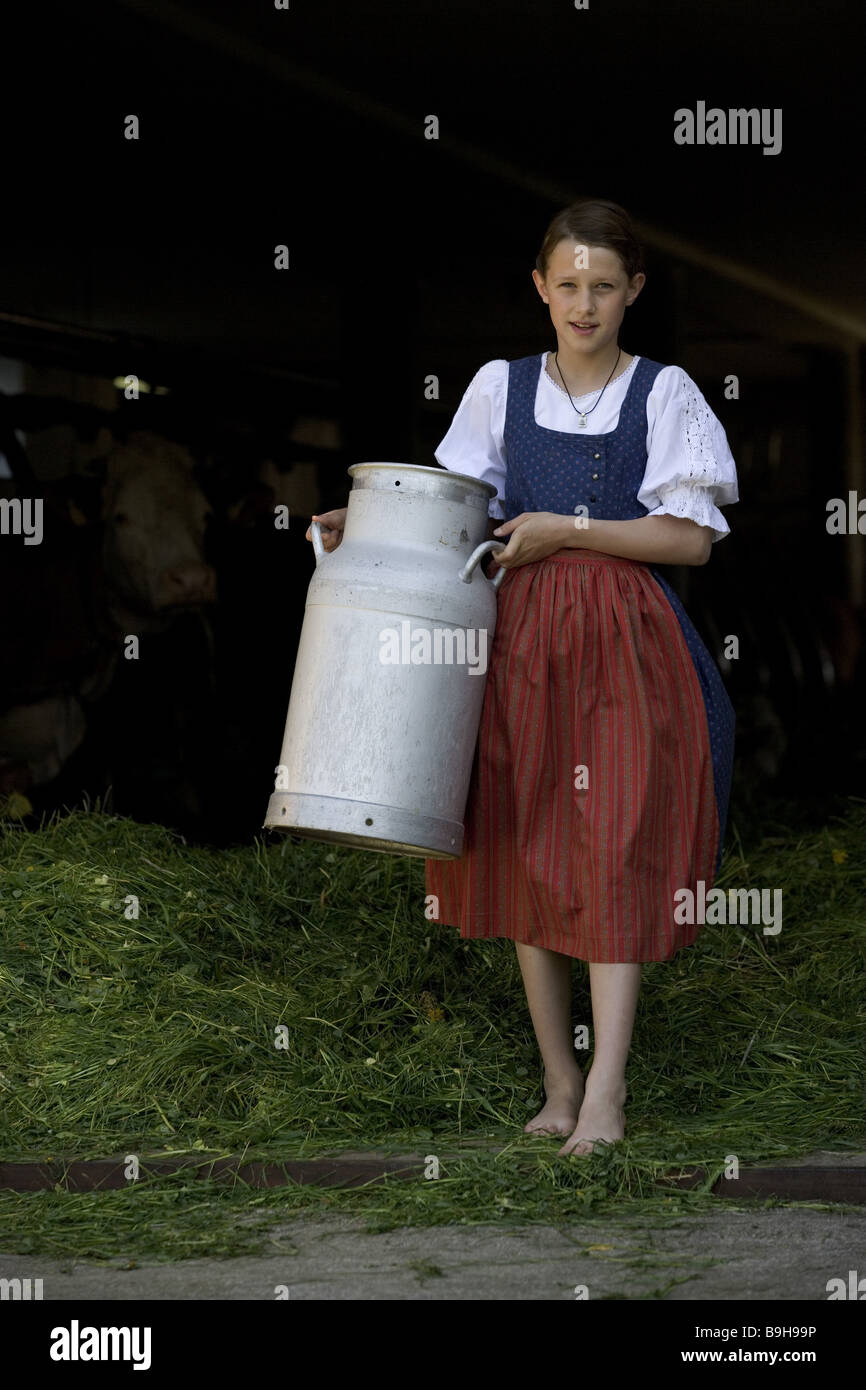 http://c8.alamy.com/comp/B9H99P/girl-farm-barnstable-milk-can-carry-B9H99P.jpg