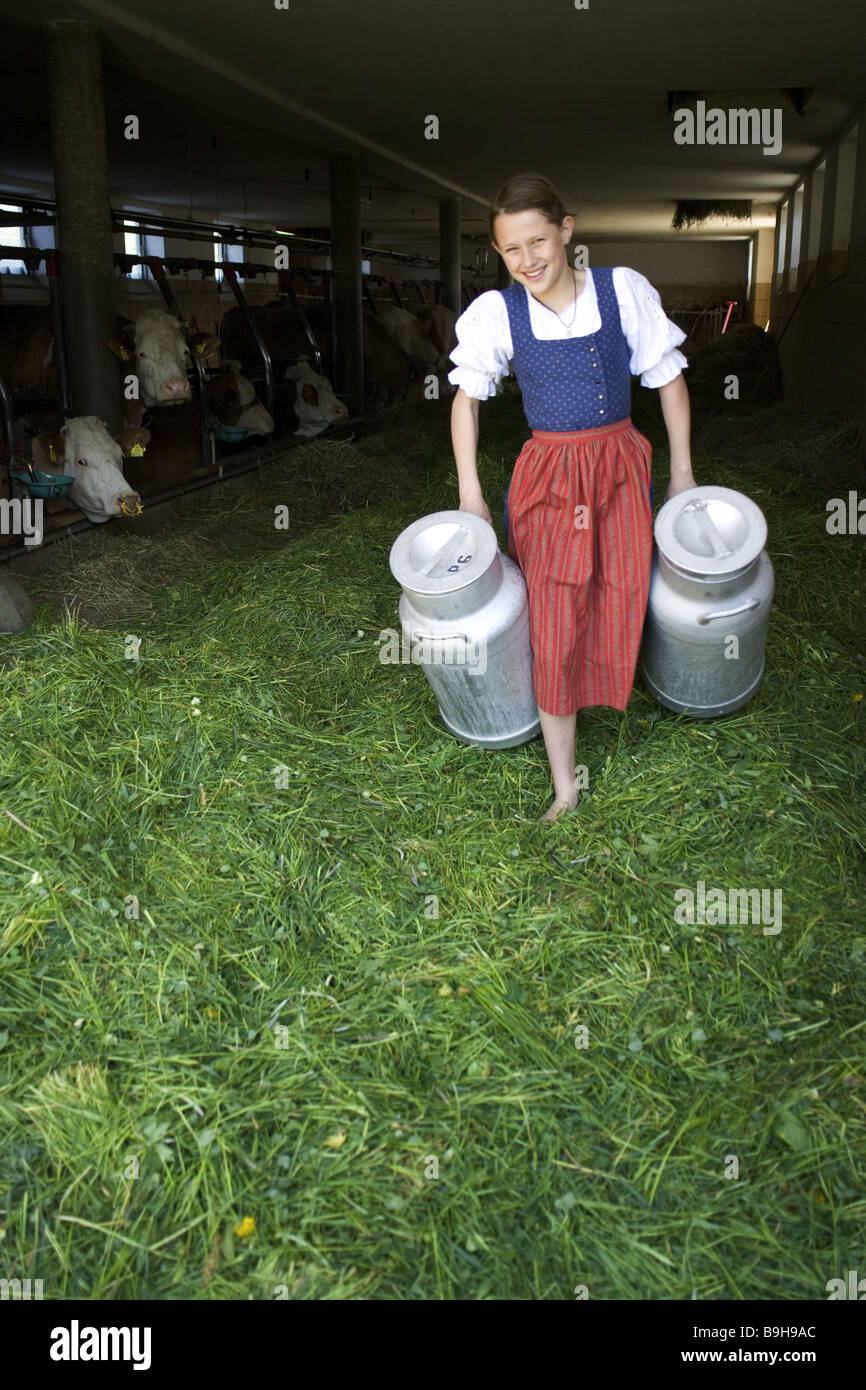 http://c8.alamy.com/comp/B9H9AC/girl-farm-barnstable-milk-cans-carry-13-years-work-task-barefoot-farm-B9H9AC.jpg