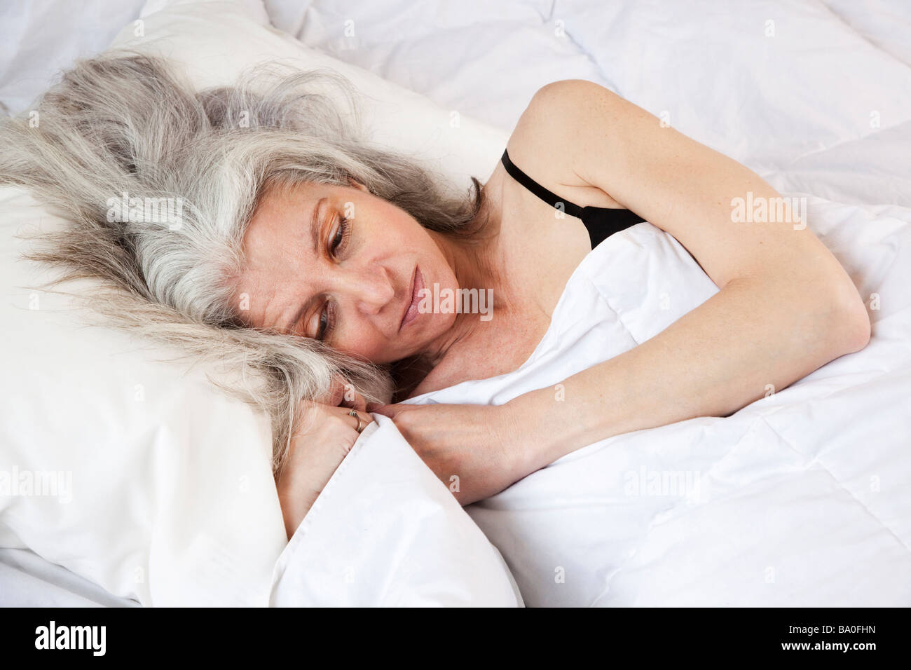 woman-in-bed-feeling-unwell-depressed-BA