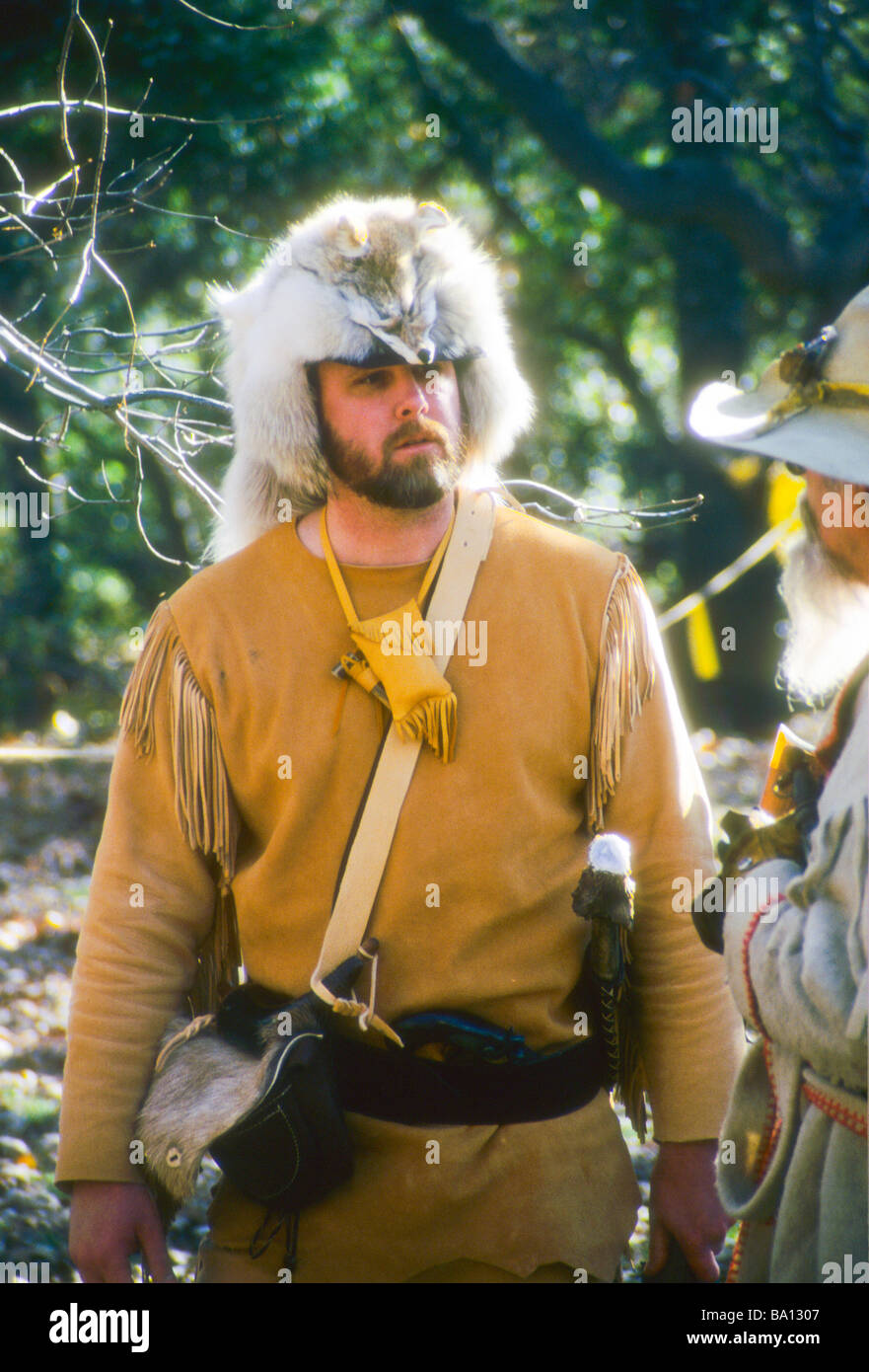 man animal skin hat wear early American costume pioneer mountain man Stock Photo, Royalty Free