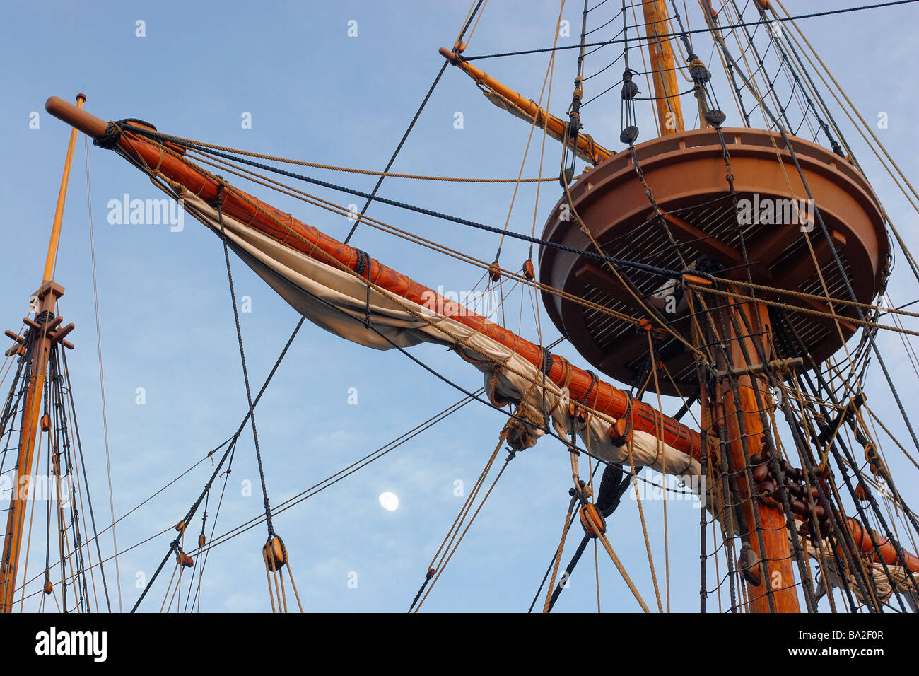 The moon visible between block and tackle rigging on a Jamestown Stock
