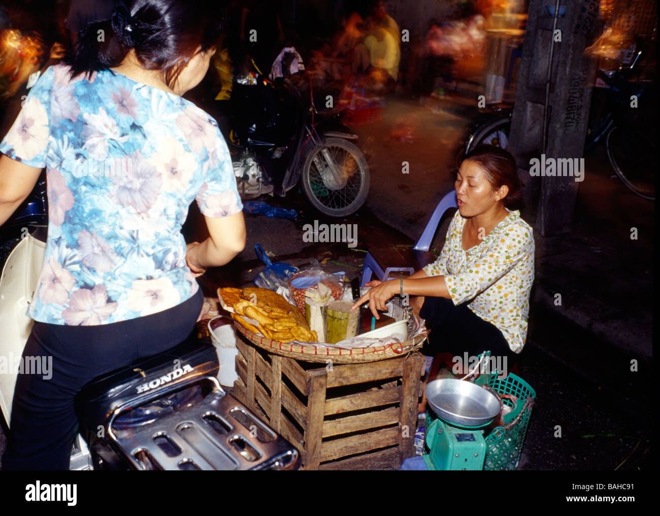 Stock Photo - street food vendor, night market, Hanoi, Vietnam