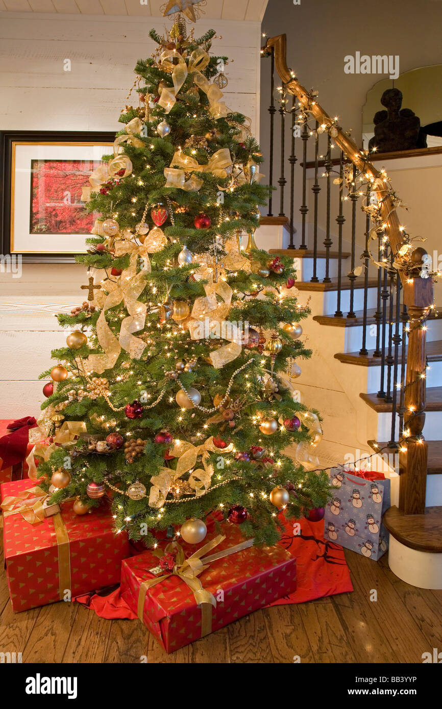 Christmas tree, presents, and decorations in an American home Stock Photo, Royalty Free Image ...
