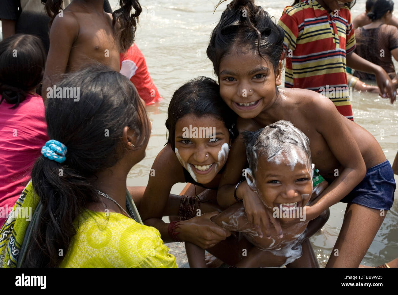 Children having fun. Ganges river. Rishikesh. India Stock Photo