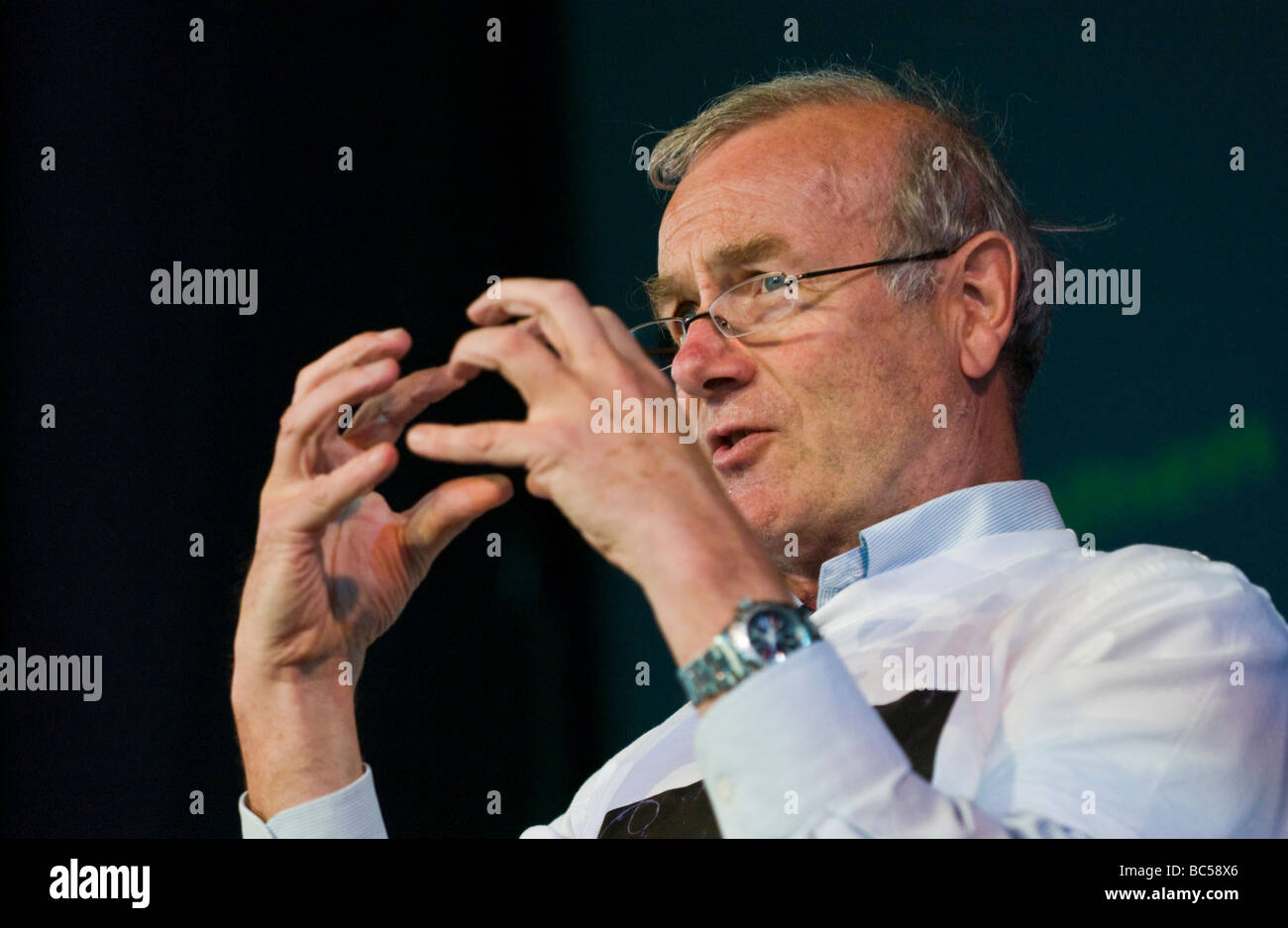 Particle physicist Professor Frank Close pictured on stage talking about anti matter at Hay Festival 2009 - particle-physicist-professor-frank-close-pictured-on-stage-talking-BC58X6