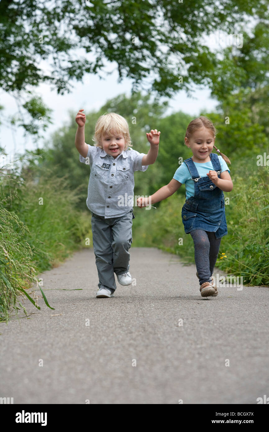 Two toddlers running Stock Photo 24958078 Alamy