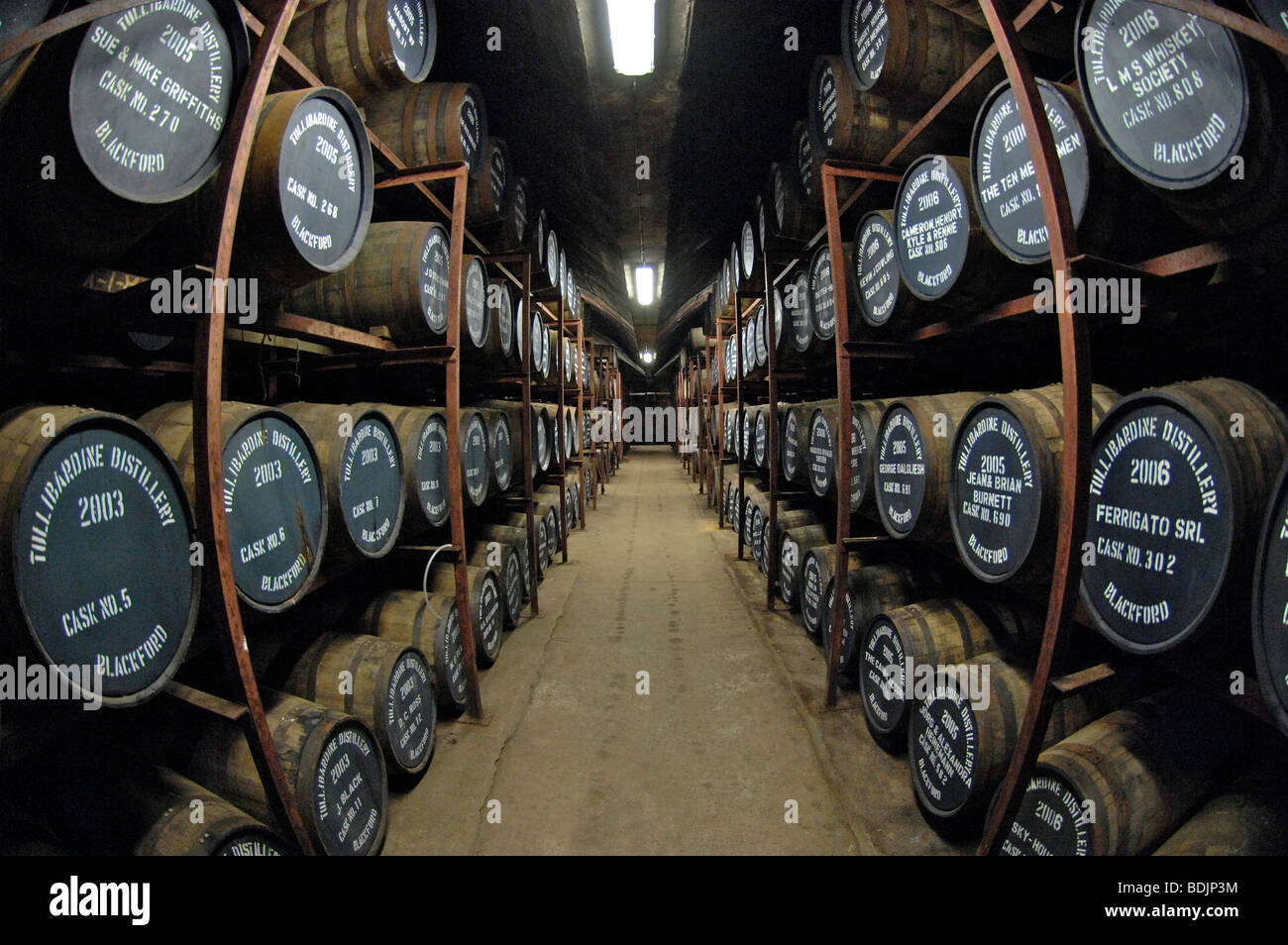 Whisky barrels in warehouse at Tullibardine distillery. Blackford Stock Photo, Royalty Free
