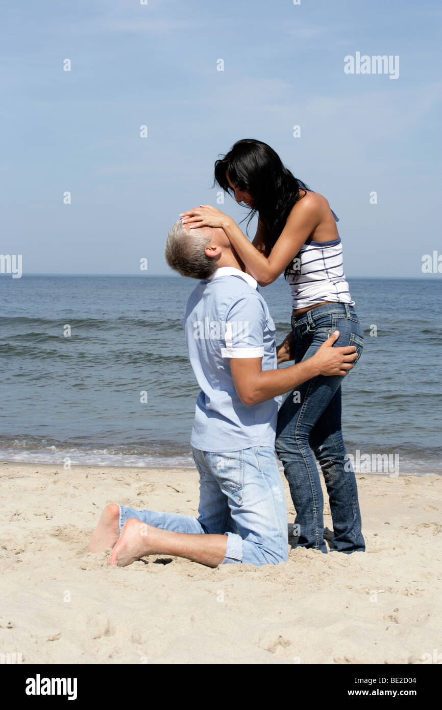 Mature Couple Sunbathing On Beach Hi Res Stock Photography And Images
