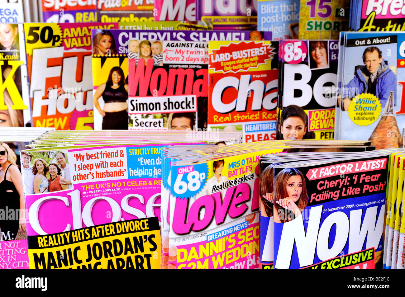 Magazines on a stand in a newsagents Stock Photo, Royalty Free Image