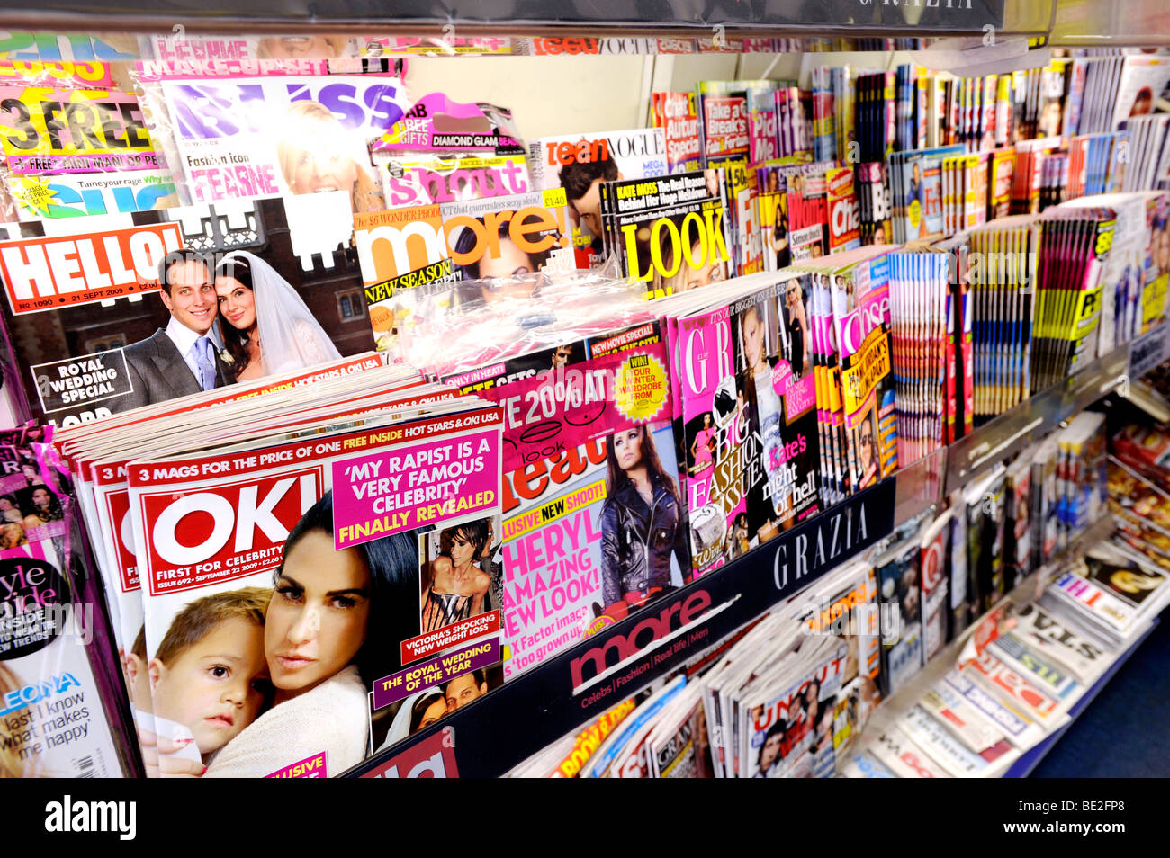 Magazines on a stand in a newsagents Stock Photo, Royalty Free Image