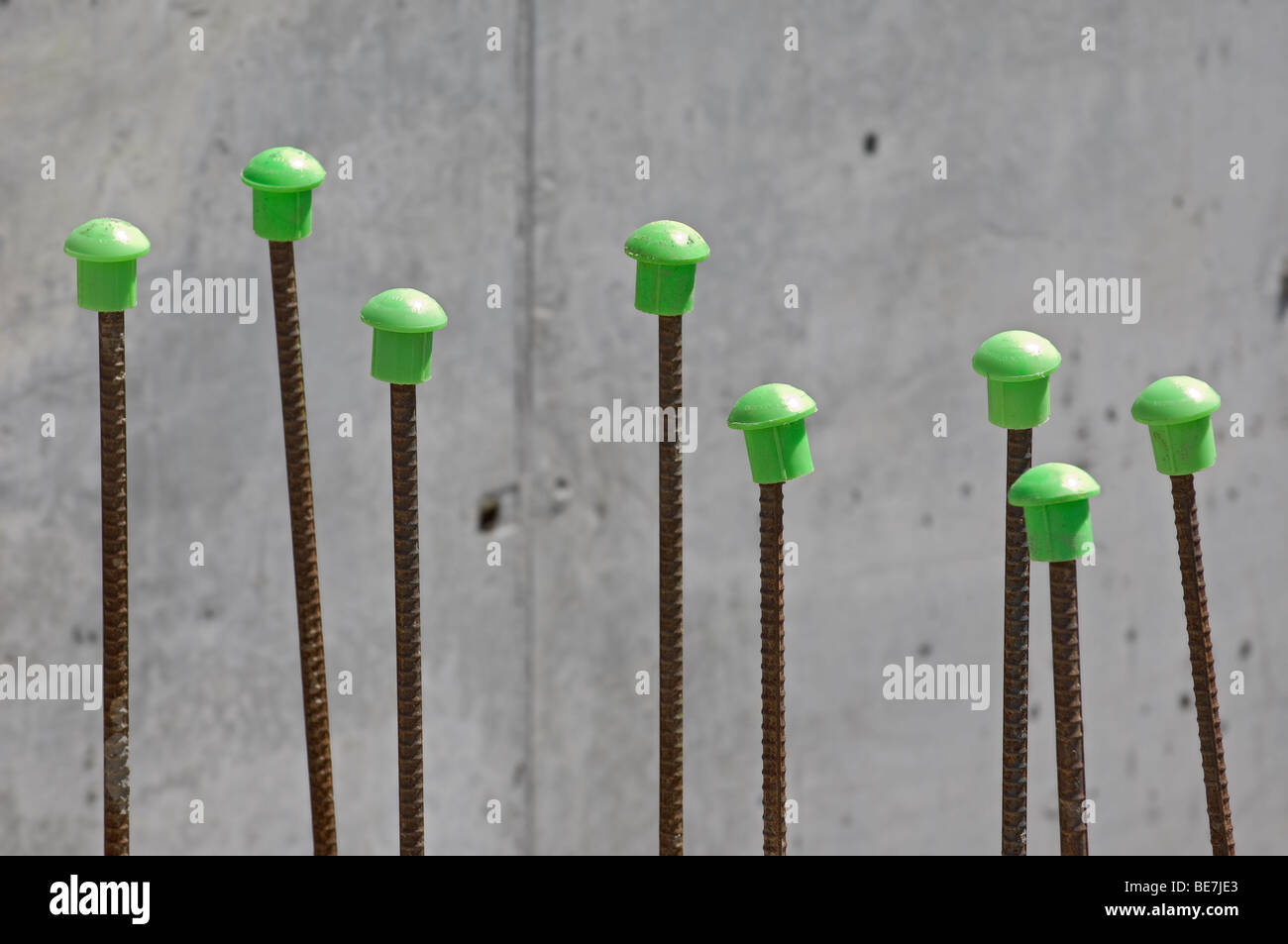rebar caps on rebar at construction site for safety Stock Photo