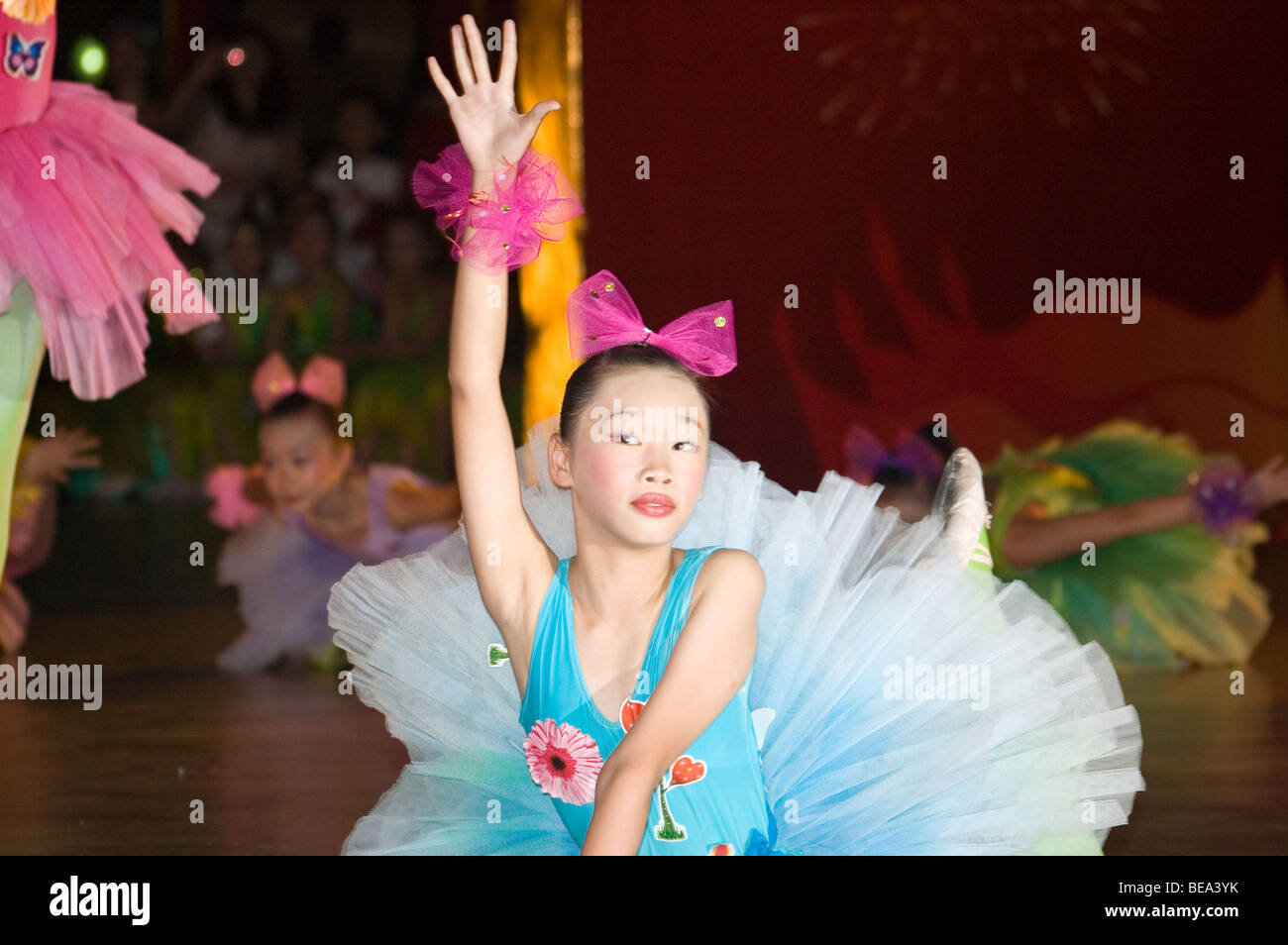 Chinese kids performing ballet dance during 60th Anniversary of Stock