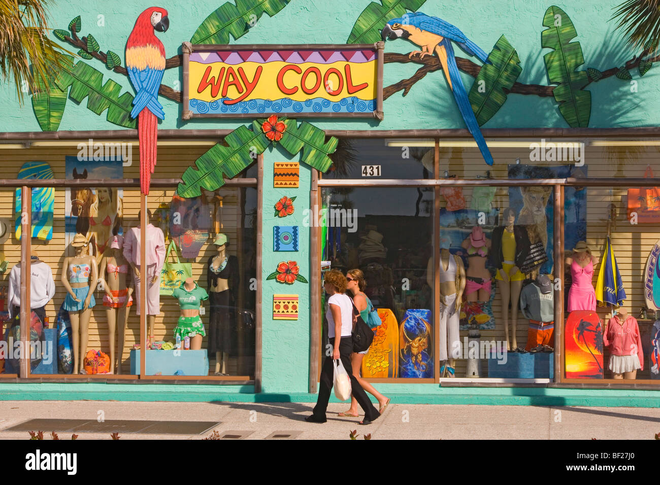 Young couple in front of a shop window, Clearwater Beach, Florida Stock