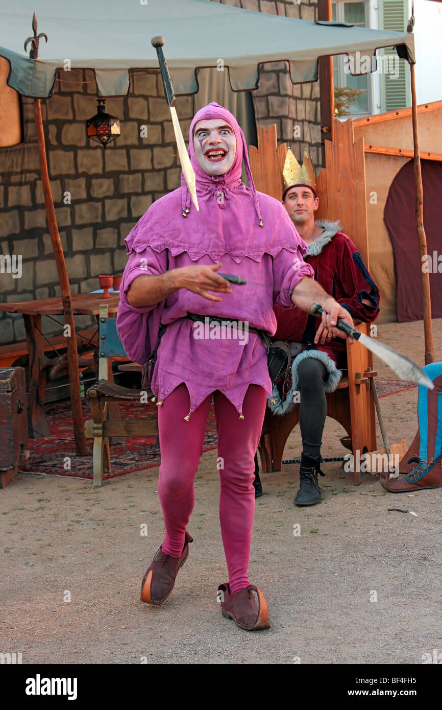 Juggler group Nimulus, court jester juggling knives, medieval market
