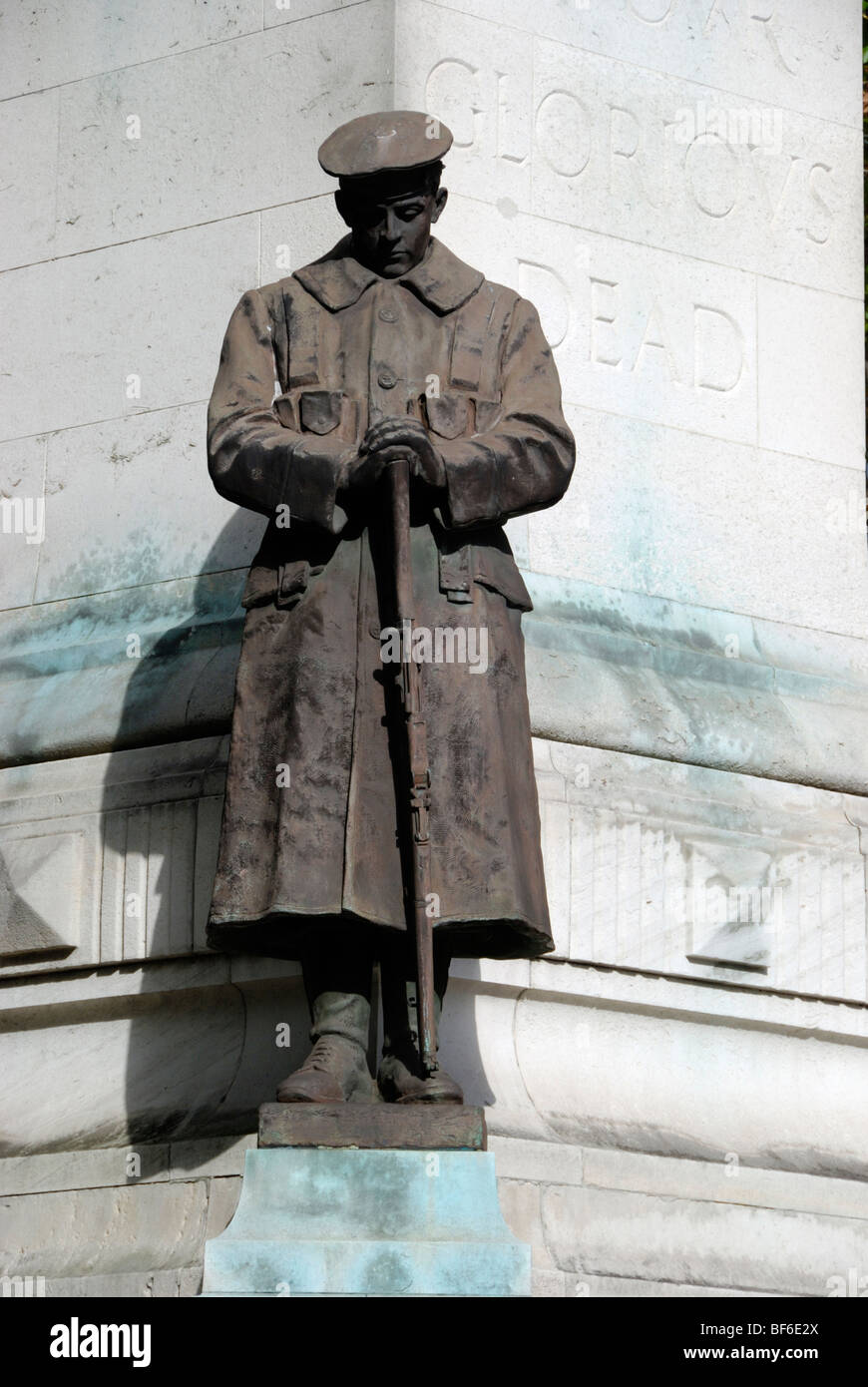 Statue of soldier on war memorial outside Euston Station, London Stock