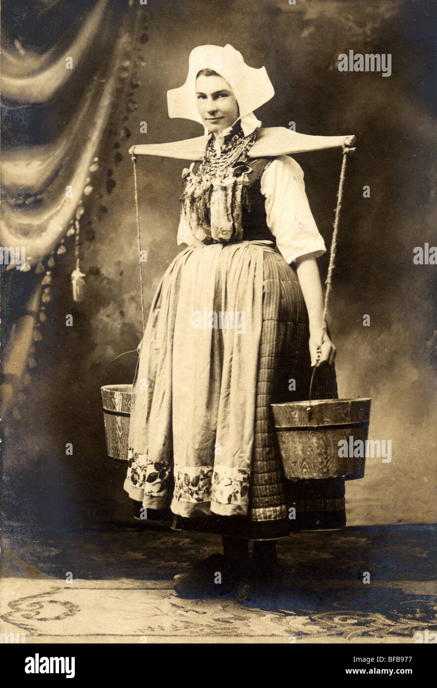 little dutch girl carrying water buckets BFB977