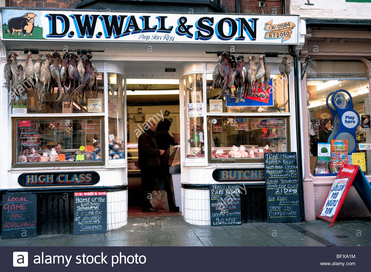Traditional butchers shop in Ludlow town centre, Shropshire, UK Stock