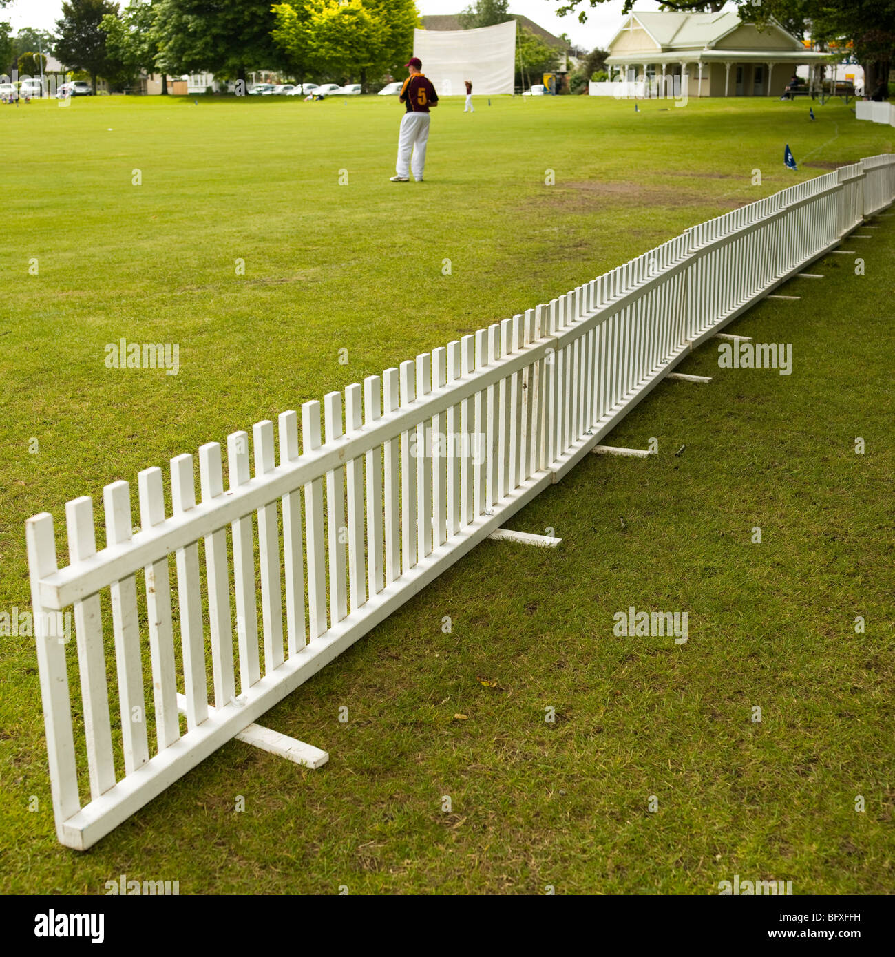 cricket pitch with white fence Stock Photo, Royalty Free Image