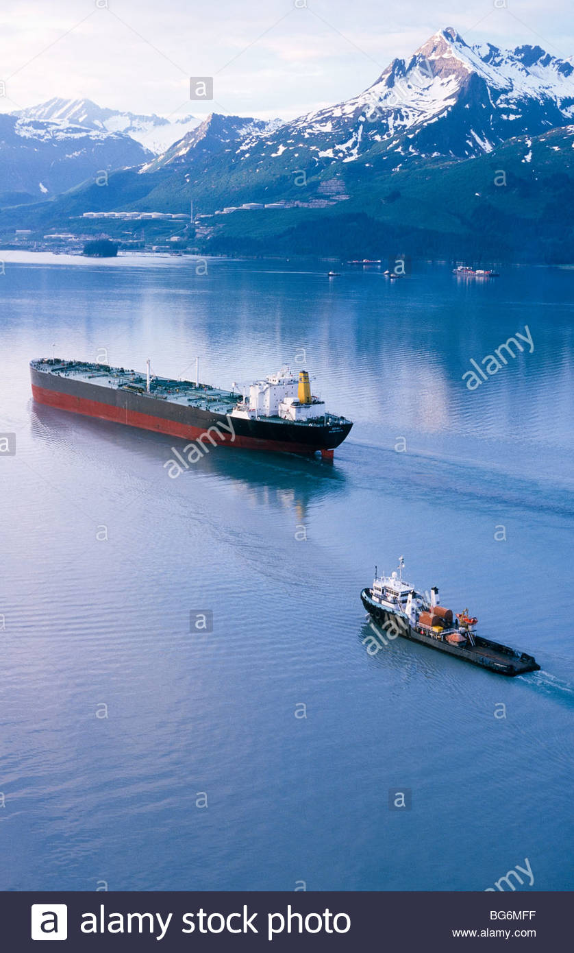 Alaska, Valdez. S/S Denali oil tanker with escort vessels heading for