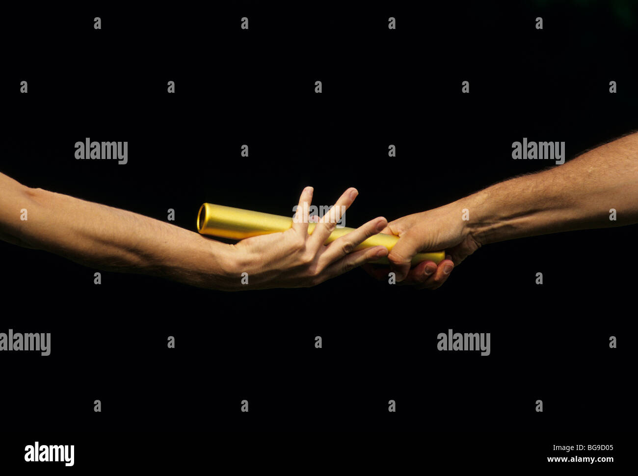 Two athletes passing a baton Stock Photo, Royalty Free Image 27252629