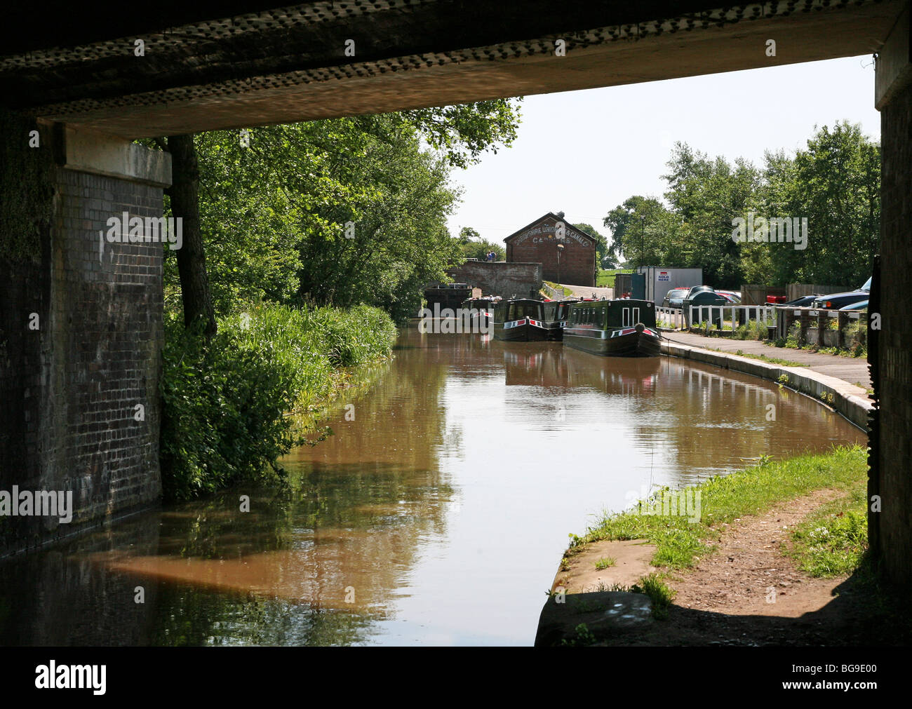 Canal boats on the canal near Bunbury wharf, Cheshire Stock Photo