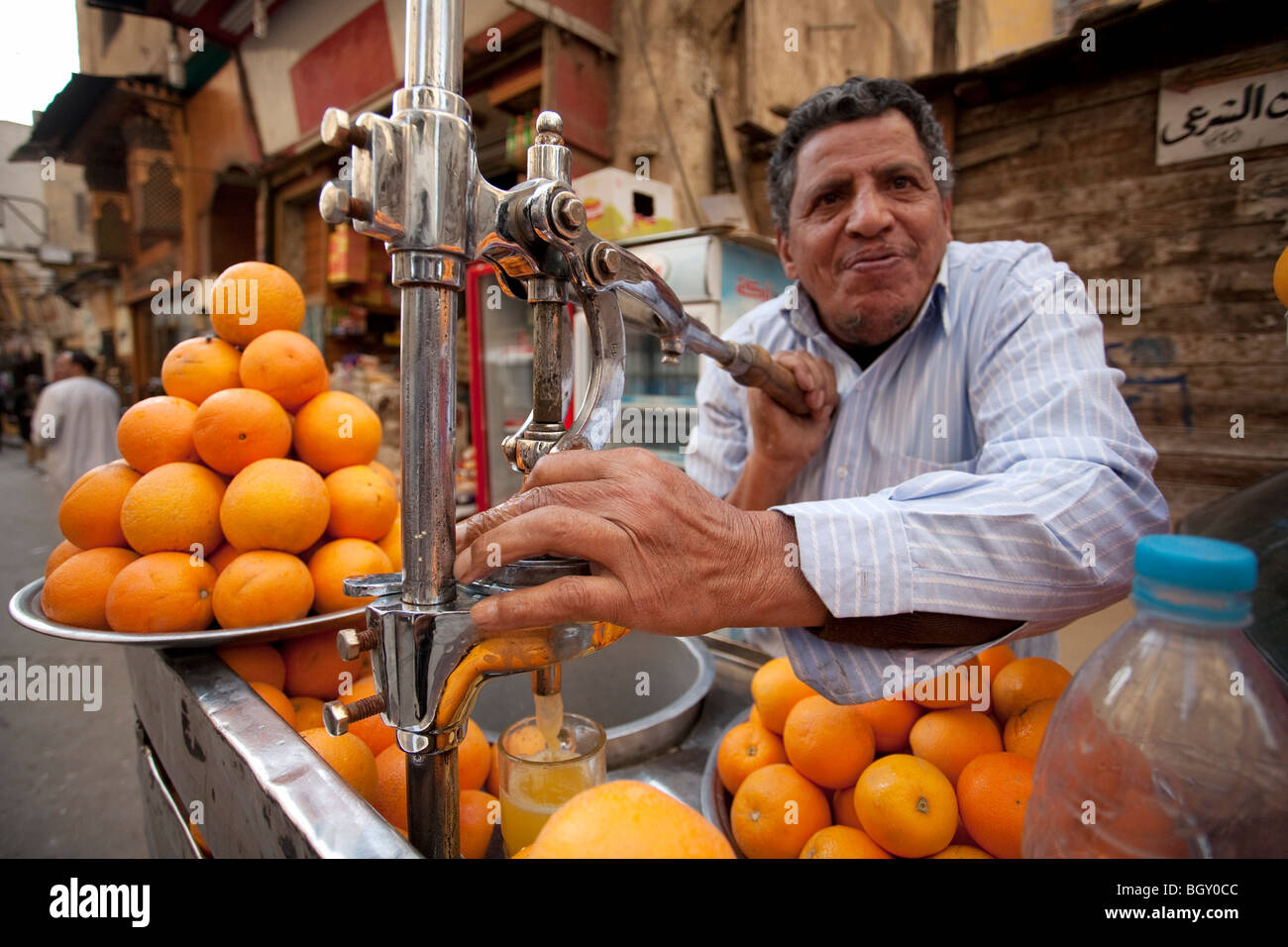 A street vendor selling orange juice Stock Photo, Royalty Free Image
