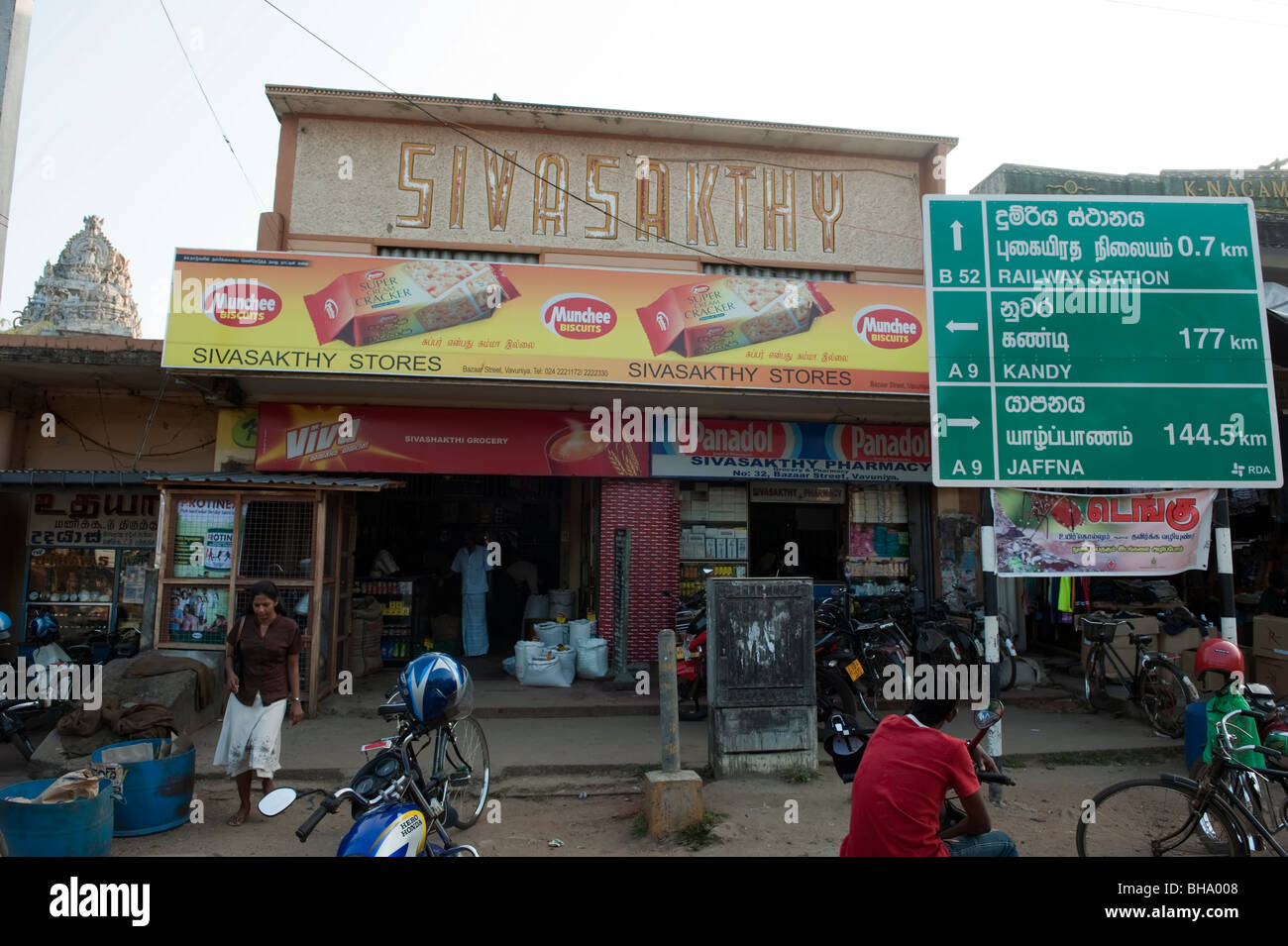 Vavuniya road sign, Kandy, Jaffna in Bazaar Street Stock Photo, Royalty