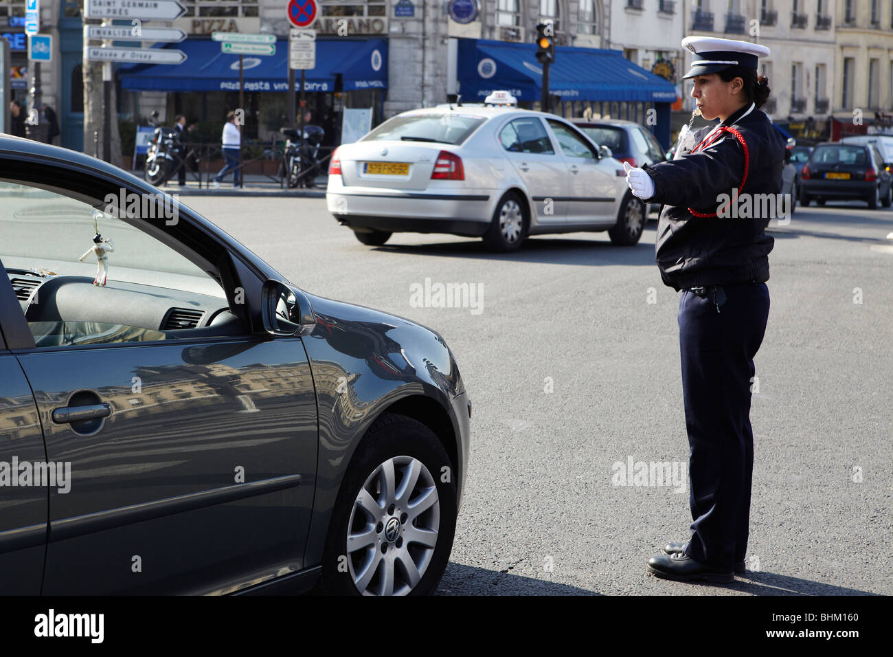 Traffic police directing traffic in Paris, France Stock Photo, Royalty