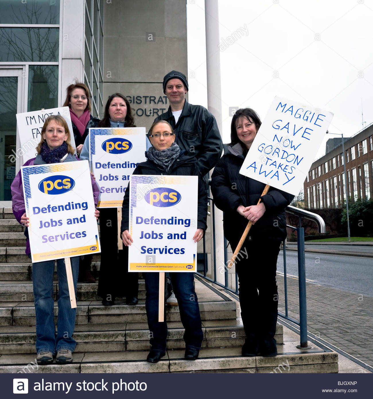 Members of the PCS trade union on strike, forming a picket line on