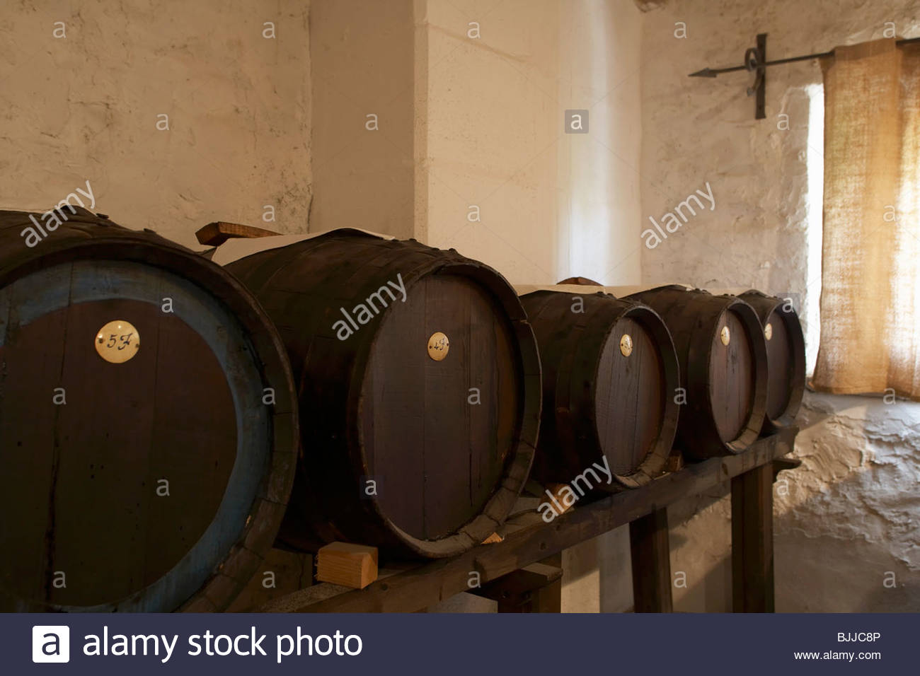 Barrels of balsamic vinegar in a cellar, Modena Stock Photo, Royalty