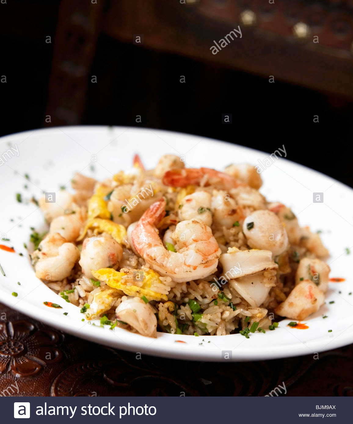 Seafood Fried Rice with Shrimp, Scallops and Squid Stock Photo, Royalty