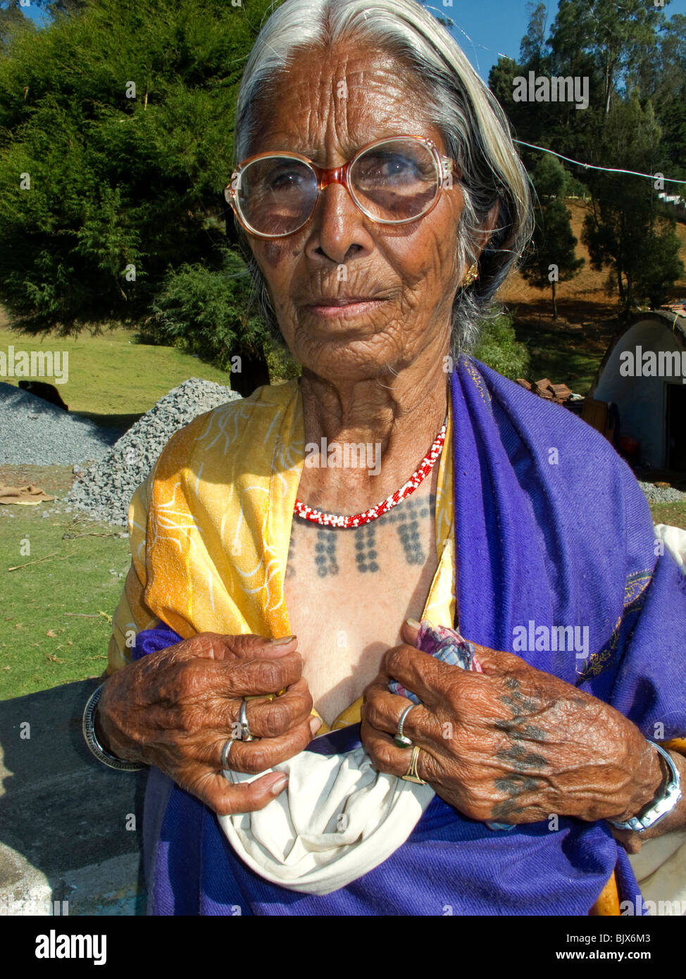 India, <b>Tamil Nadu</b>, Udhagamandalam (Ooty), Toda tribal woman displaying ... - india-tamil-nadu-udhagamandalam-ooty-toda-tribal-woman-displaying-BJX6M3