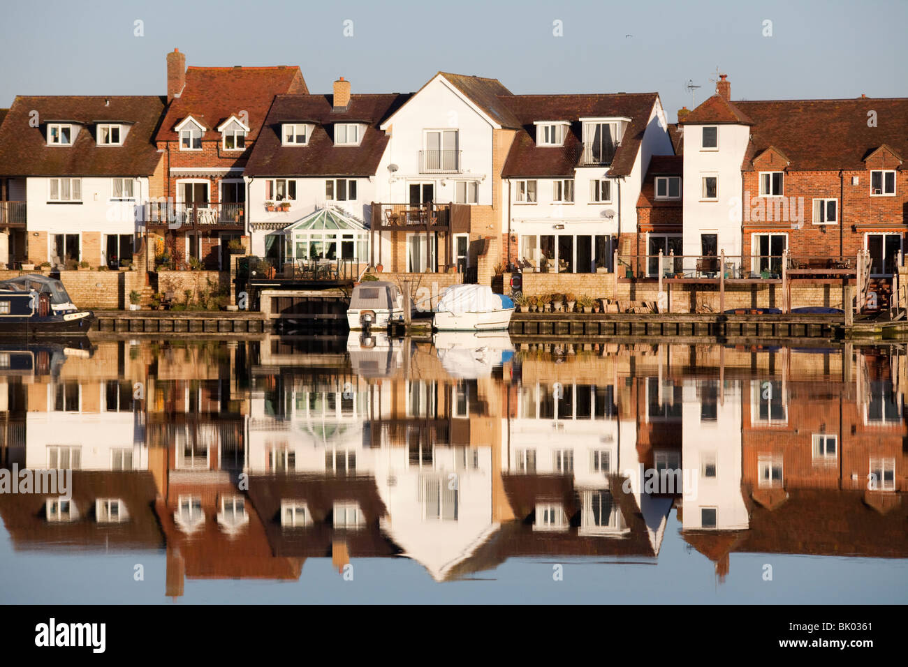 North Quay houses reflecting in Abingdon marina on the Thames just