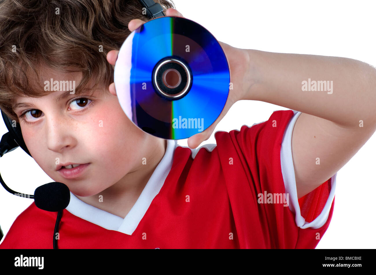 Boy listening music with cdrom´s Stock Photo, Royalty Free Image