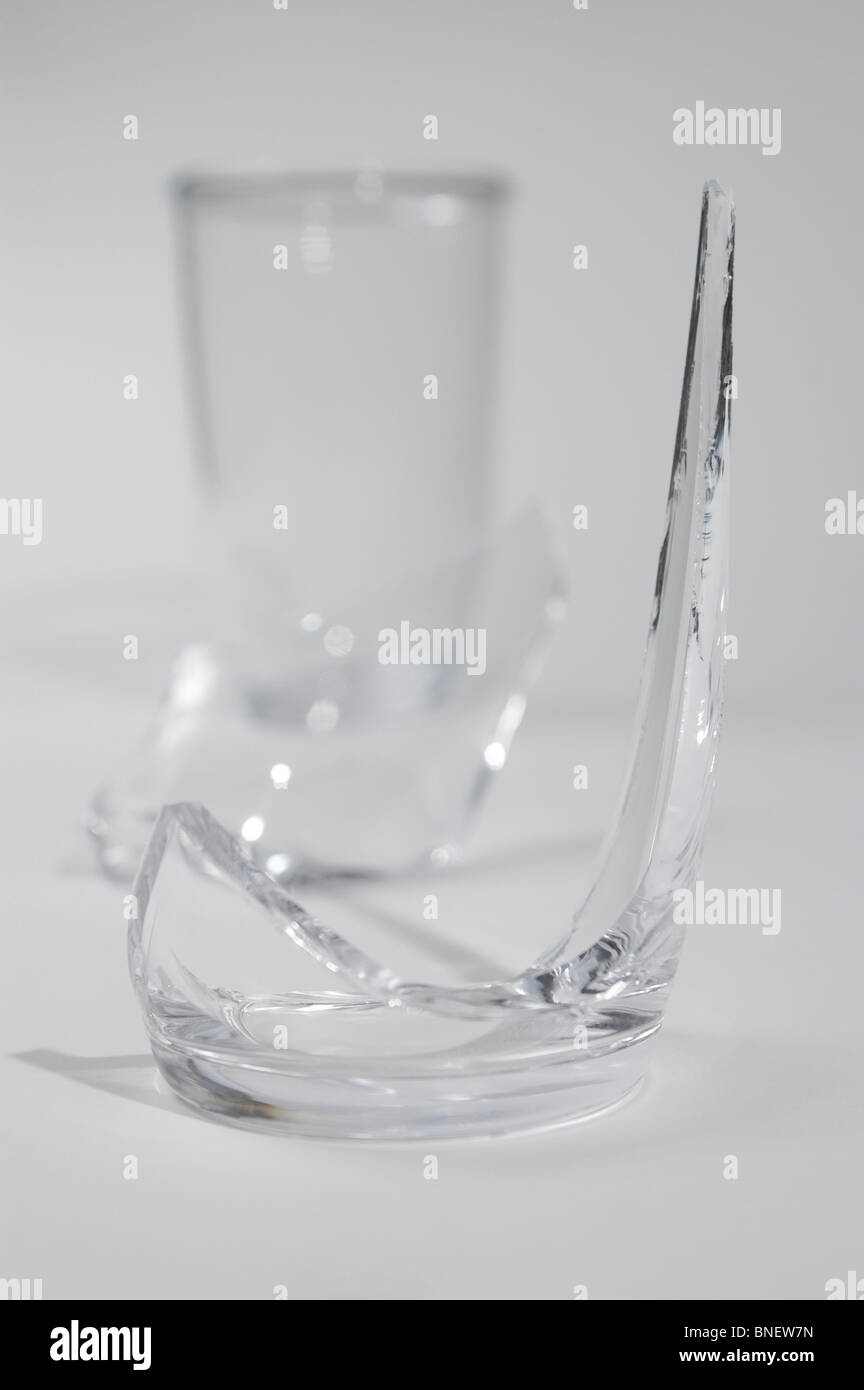 Pieces of a broken drinking glass Stock Photo, Royalty Free Image