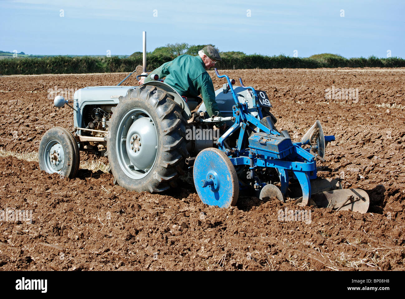 a vintage tractor at a " ploughing match " near truro in cornwall, uk