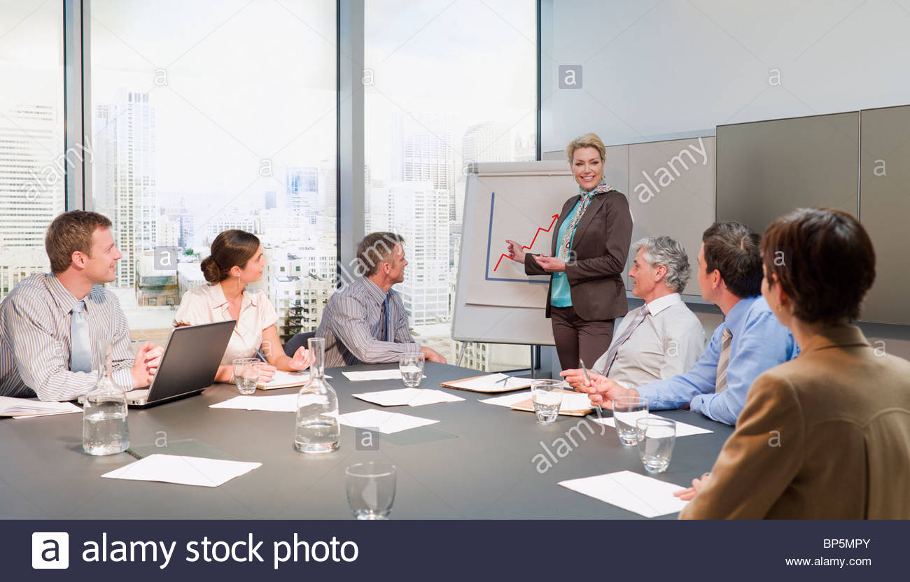 Businesswoman leading meeting in conference room Stock Photo, Royalty