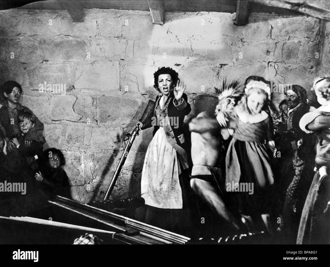 CLAUDETTE COLBERT DRUMS ALONG THE MOHAWK (1939 Stock Photo, Royalty