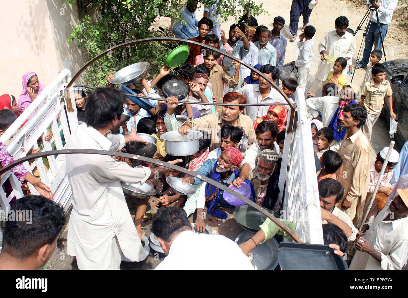 Food Being Distributed Among Flood Affected People At Flood Affectees