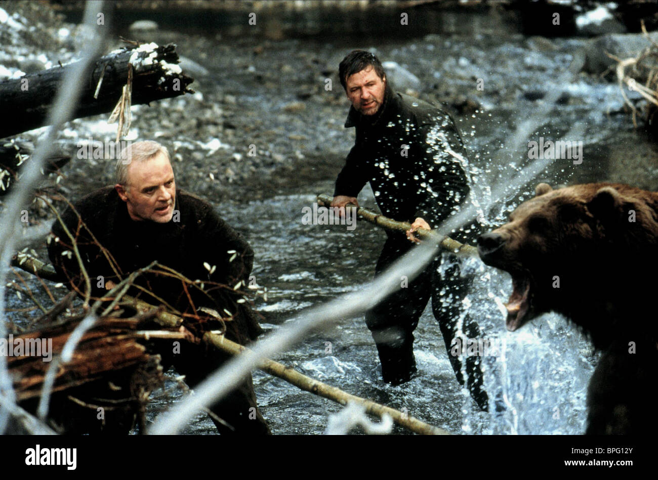 ANTHONY HOPKINS & ALEC BALDWIN THE EDGE (1997 Stock Photo, Royalty Free