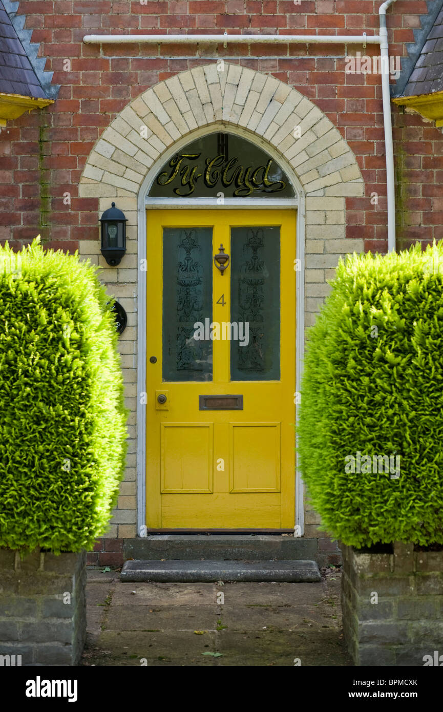 steps up to yellow front door of traditional victorian terraced steps up to yellow front door of traditional victorian terraced