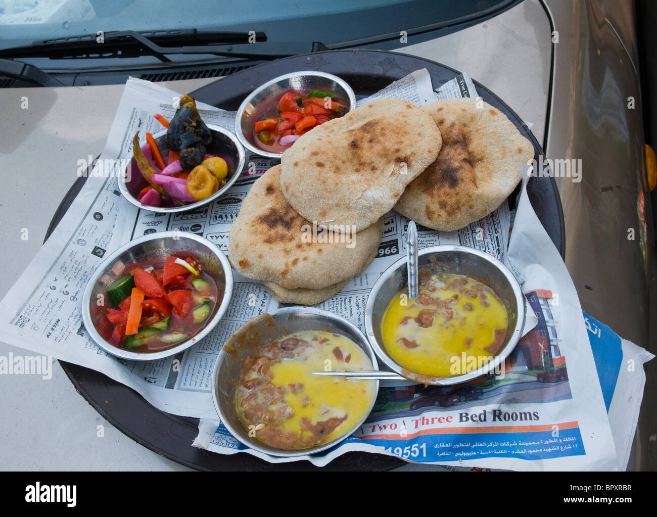 fuul beans and pita bread a typical meal in Cairo Egypt Stock Photo